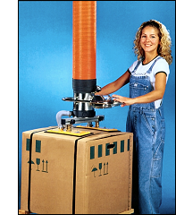 A woman attaching a vacuum tube lift to a cardboard box